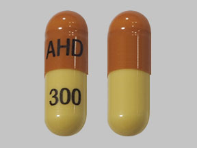 Gabapentin 300 mg Strides Shasun,  AHD 300 Pill – brown & yellow capsule/oblong, 19mm